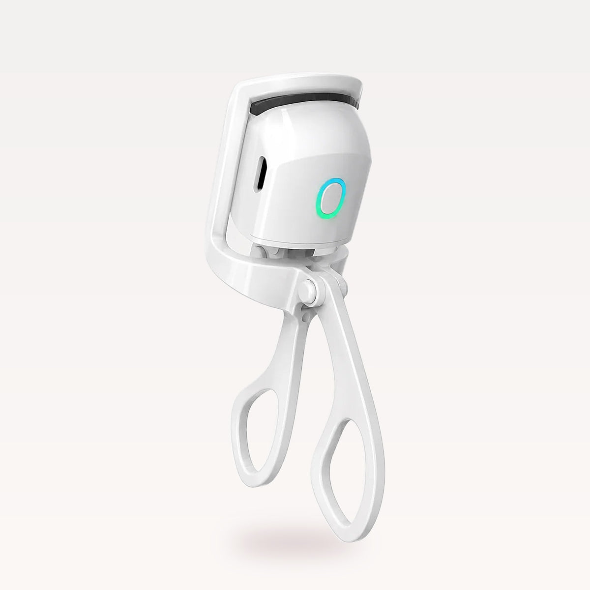 Heated eyelash curler with 2 heat settings in white