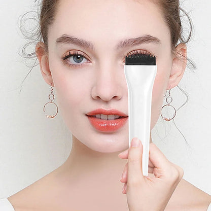 Heated eyelash curler wand being used on lashes